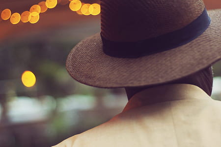 Shallow Focus of Man in Brown Hat thumbnail