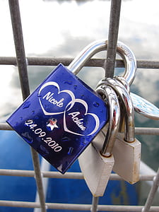 three padlocks on cage thumbnail