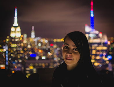 Bokeh Photograph of Woman during Nighttime thumbnail