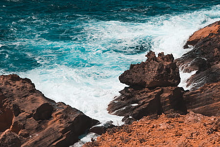 Photo of Rocks Formation on Seashore thumbnail