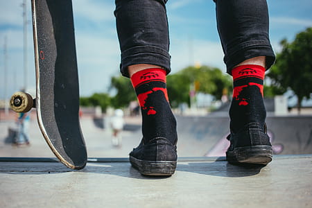 A view of skateboarder s feet with skateboard on the ramp thumbnail