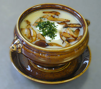 cooked soup served on brown ceramic bowl thumbnail