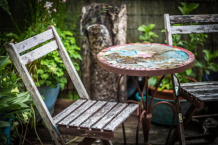 white wooden chair standing near table thumbnail