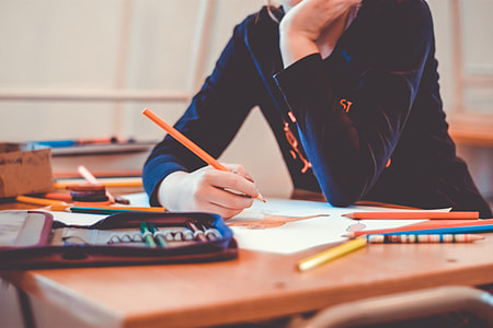 Student pupil drawing in school classroom thumbnail