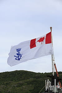 ST. JOHN S, NEWFOUNDLAND AND LABRADOR, CANADA - JULY 13, 2017. Flag on a Canadian Naval ship upon returning from a patrol in the North Atlantic, taken on July 13, 2017 in St. John s . thumbnail
