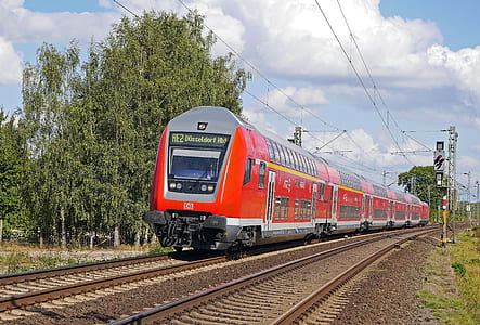 red and gray train during daytime thumbnail