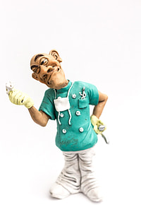 man holding handheld tool figurine thumbnail