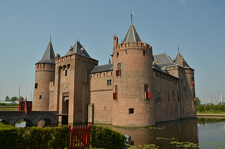 beige concrete castle under blue sky during daytim,e thumbnail