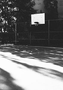 grayscale photography of basketball hoop thumbnail