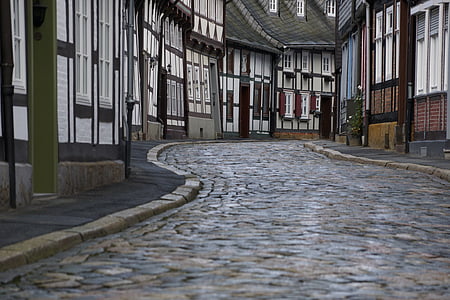 gray concrete road during daytime thumbnail