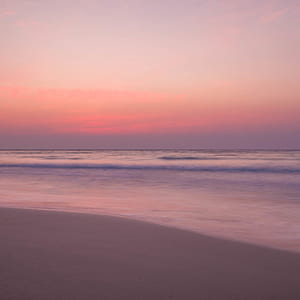 photo of beach waves during golden hour thumbnail