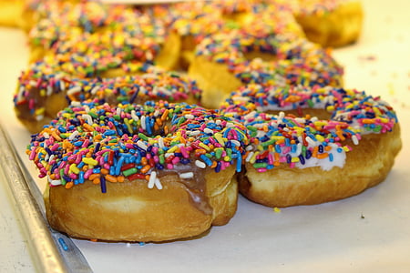 bunch of doughnut with sprinkles on top thumbnail