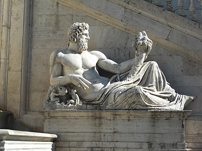 man laying down on stone statue thumbnail