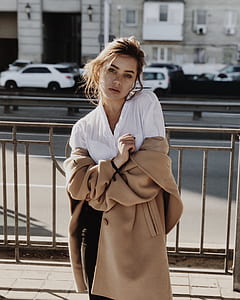 woman wearing browns suede button-up topcoat thumbnail