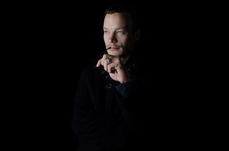 man with black background thumbnail