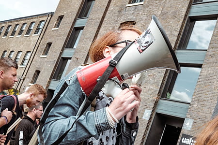 woman speaker thru megaphone thumbnail