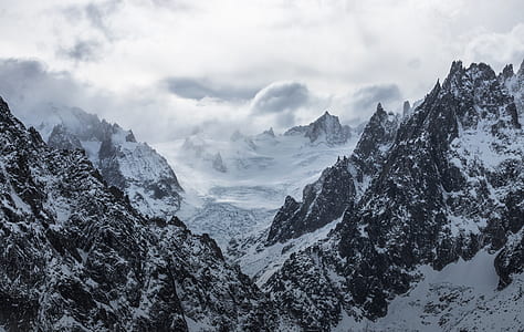 landscape photo of snow caped mountains thumbnail