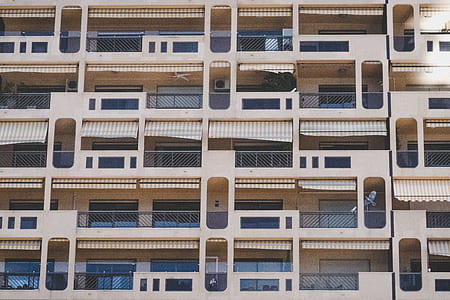 white concrete high-rise building thumbnail
