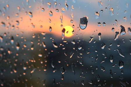closeup photo of water drops on glass thumbnail