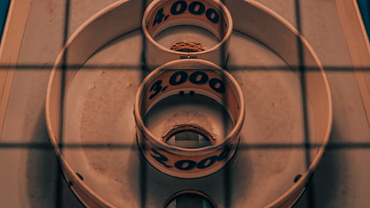 two round white containers on round tray thumbnail