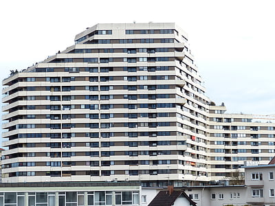 brown and white high-rise building during daytime thumbnail