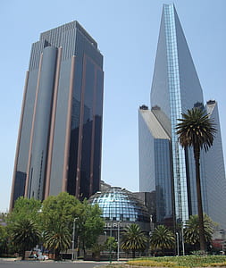 two curtain wall high-rise building at daytime thumbnail