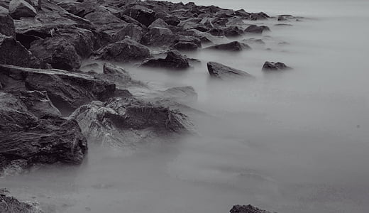 grayscale photography of rocks thumbnail