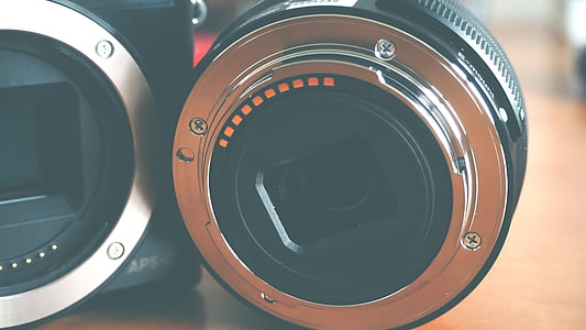 close up photography of camera lens on table thumbnail