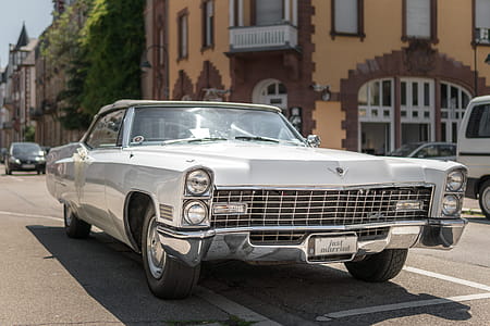 Vintage White Coupe on Road thumbnail