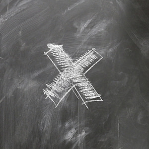 white x mark on black surface thumbnail