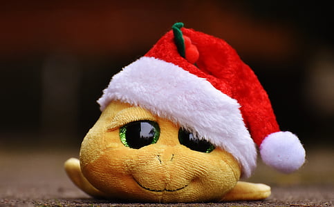 yellow animal plush toy wearing Santa hat thumbnail