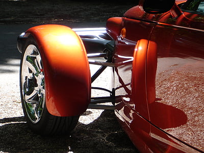 orange car with black tire thumbnail