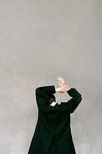 Person Wearing Black Coat thumbnail