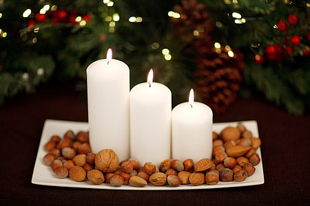 three white pillar candles on tray thumbnail