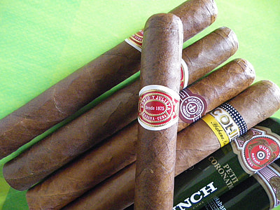five tobaccos on green surface thumbnail