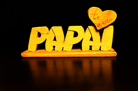 yellow Papai wooden freestanding letters on black surface thumbnail