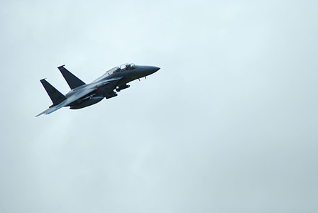 gray fighter jet in mid air thumbnail
