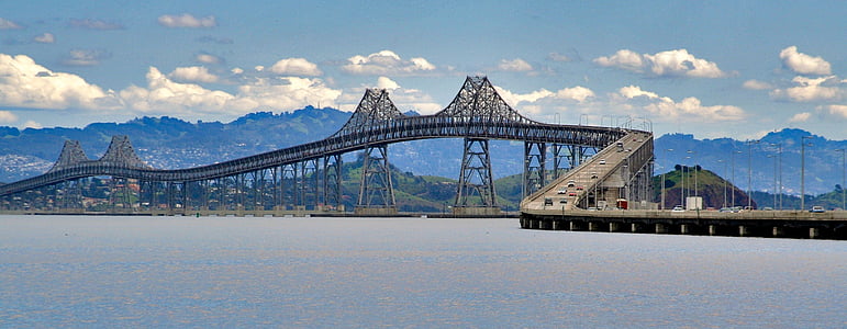 cars on gray suspension bridge thumbnail
