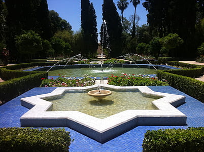 white and brown outdoor fountain at daytime thumbnail