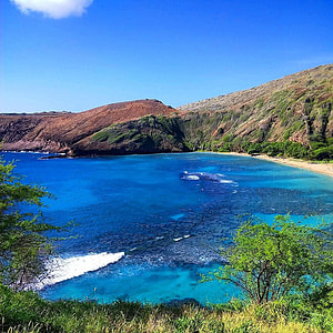 sea shore with mountain background thumbnail