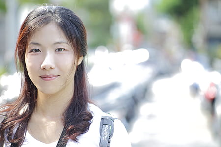 Woman in White V Neck Shirt in Selective Focus Photography thumbnail