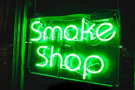 green lighted smoke shop neon light signage thumbnail