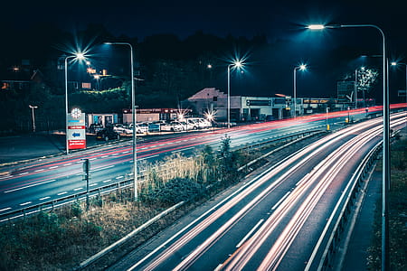 Time Lapse Photo Of Vehicles At Night Time thumbnail