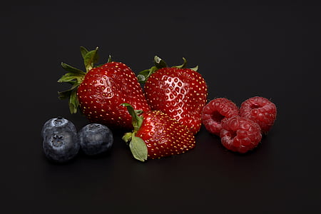 still life photography of bunch of strawberries thumbnail