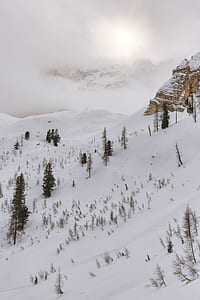 sunrise on mountain covered with snow thumbnail