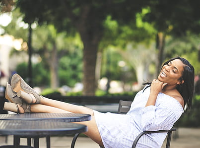 Shallow Photography on Woman Sitting on Chair thumbnail