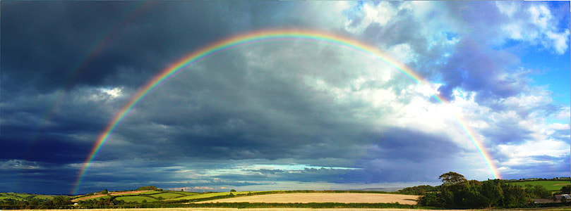 rainbow under blue sky thumbnail