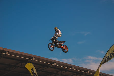 man doing motorcycle stunt thumbnail