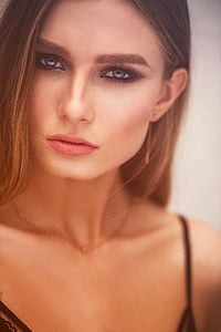 woman's face with makeup and lipstick thumbnail
