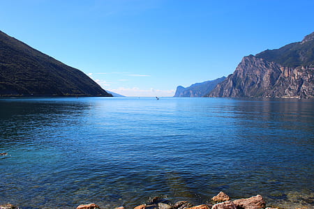 body of water and mountain thumbnail